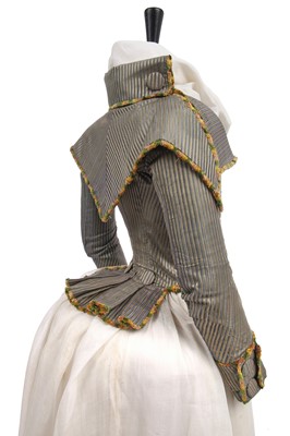 Lot 297 - A fine and rare striped silk caraco à la 'Pierrot' jacket, embroidered 'petticoat' and fichu, circa 1790
