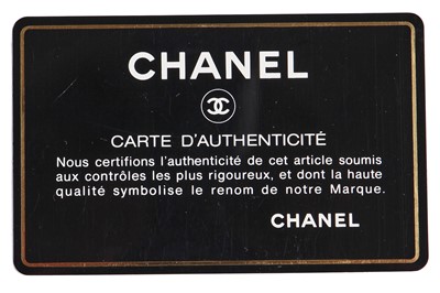 Lot 9 - A Chanel quilted black satin evening bag, 1994-96