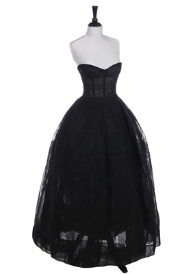 Lot 228 - A Christian Dior couture black petticoat with integral corset, Autumn-Winter 1958