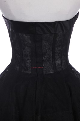 Lot 228 - A Christian Dior couture black petticoat with integral corset, Autumn-Winter 1958