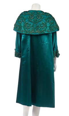 Lot 315 - A peacock-green satin evening coat, Hong Kong for the European market, circa 1960