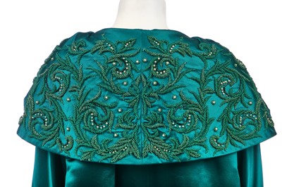 Lot 315 - A peacock-green satin evening coat, Hong Kong for the European market, circa 1960