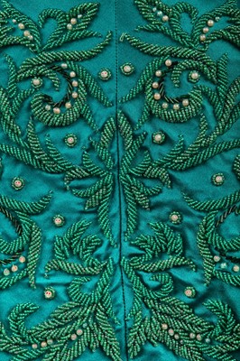 Lot 315 - A peacock-green satin evening coat, Hong Kong for the European market, circa 1960