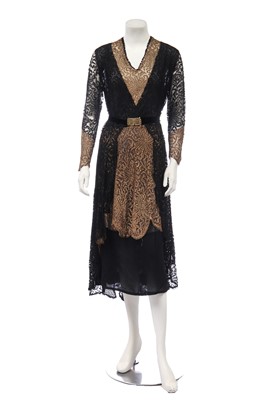 Lot 408 - A gold and black lace dress, circa 1930