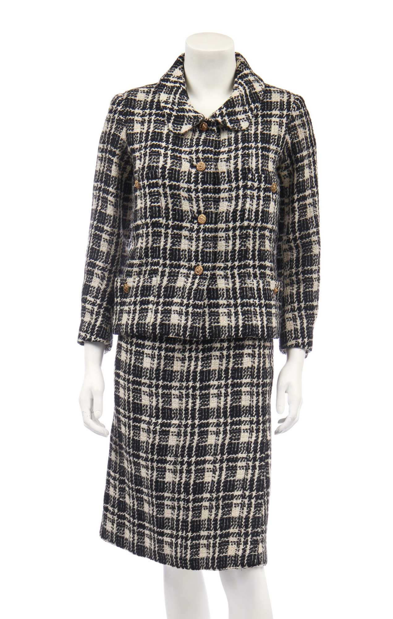 Lot 14 - A Chanel couture black and white tartan wool suit, mid 1960s