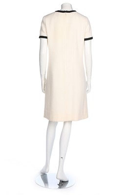 Lot 11 - A Chanel cream and black wool dress, 2005,...