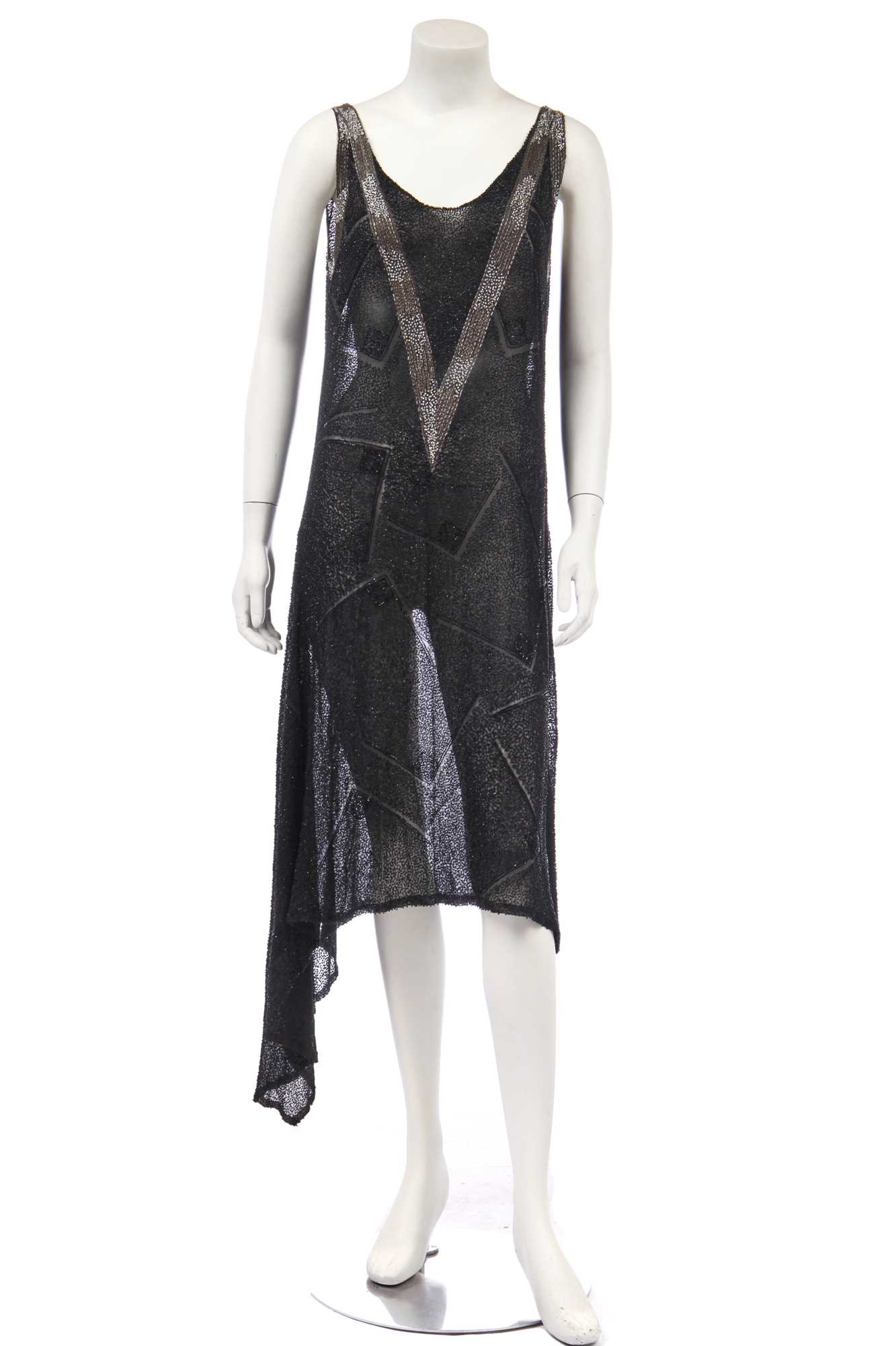 Lot 458 - A beaded black muslin flapper dress, circa