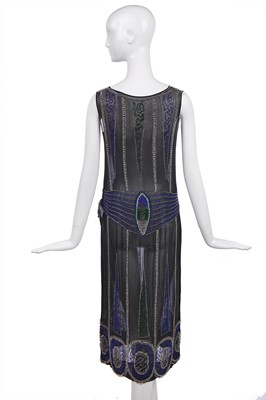 Lot 220 - A beaded black chiffon flapper dress, circa 1925