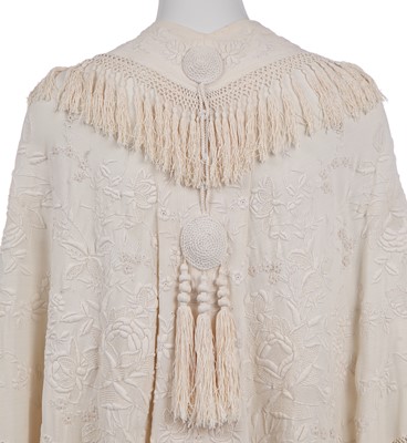 Lot 216 - A good embroidered ivory silk crêpe shaped shawl, Cantonese for the European market, 1900-1910s