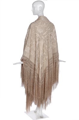 Lot 554 - A finely embroidered ivory silk shawl/cover, Cantonese for the European market, 1910s-20s