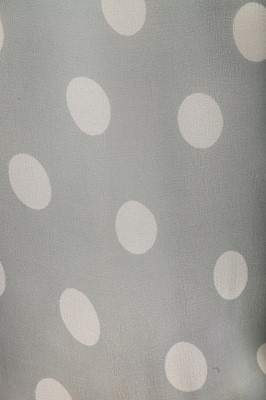 Lot 420 - A polka-dot blue-grey chiffon evening gown, 1930s