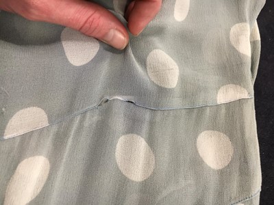 Lot 420 - A polka-dot blue-grey chiffon evening gown, 1930s