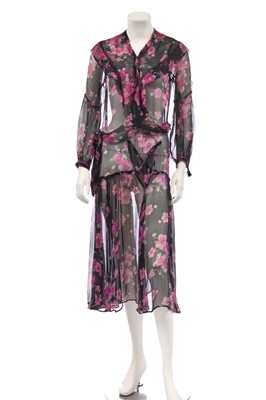 Lot 427 - A floral printed chiffon dress in shades of black and purple, 1930s