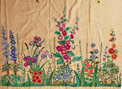Lot 530 - A crewel-work calico curtain/panel, 1920s or 30s