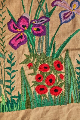 Lot 530 - A crewel-work calico curtain/panel, 1920s or 30s