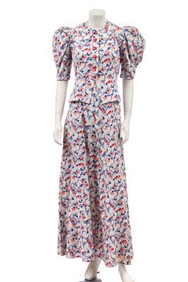 Lot 400 - Three printed cotton dresses, late 1930s-early 40s