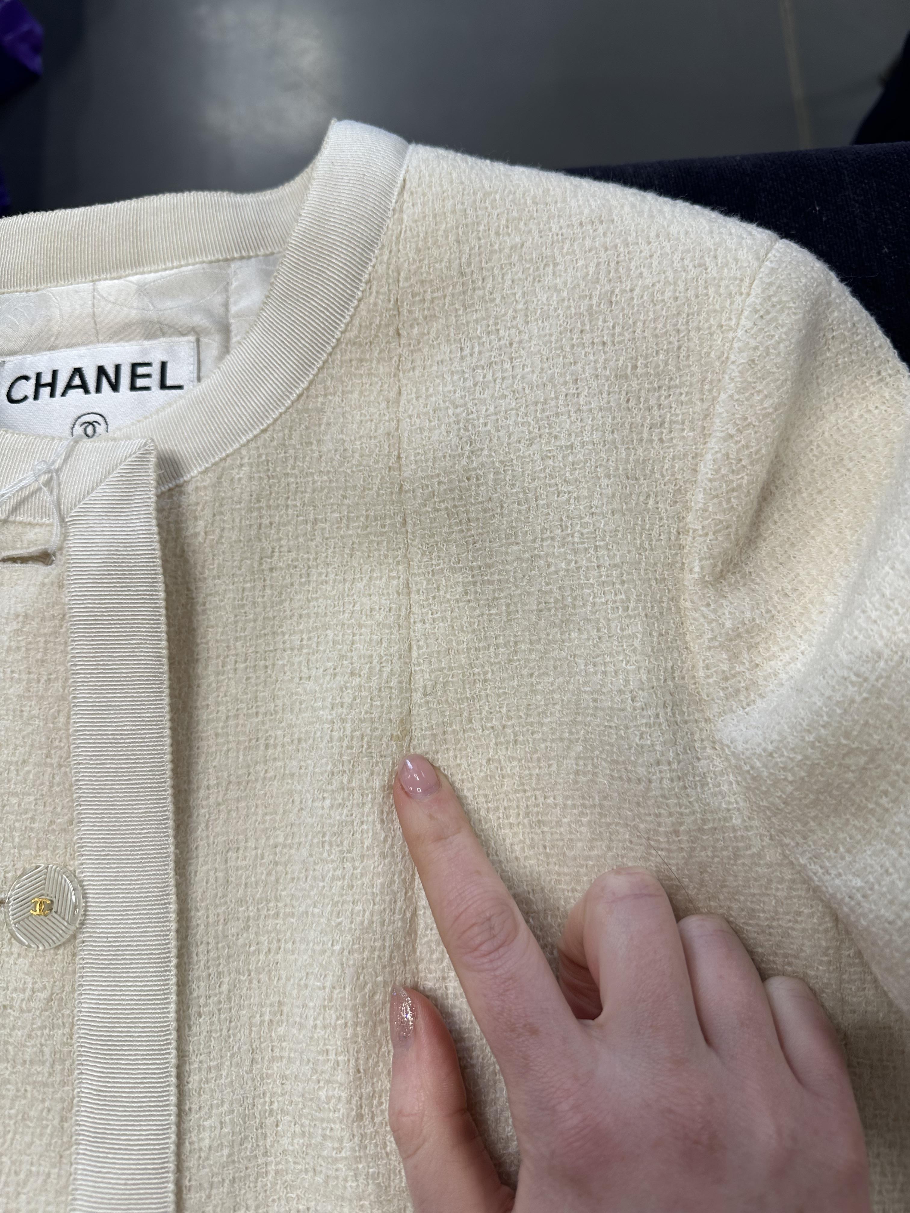Lot 15 - A Chanel cream tweed jacket Spring/Summer