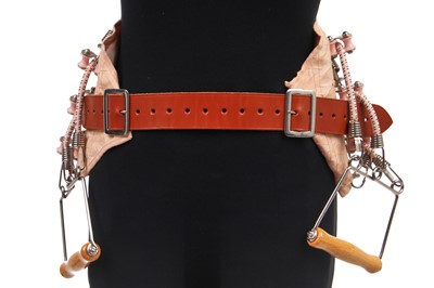 Lot 380 - A Rallie Health Appliances waist-slimming exercise belt, 1957