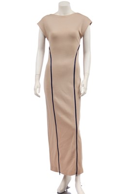 Lot 136 - A Geoffrey Beene beige wool evening dress with purple zippers, 1990s