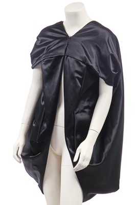 Lot 104 - An Alexander McQueen black satin cape, Pre-Fall 2007