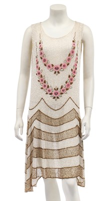 Lot 473 - A beaded white flapper dress, circa 1928