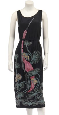 Lot 474 - An Adair beaded black silk evening dress, circa 1922-4