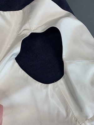 Lot 107 - An Alexander McQueen off-white silk faille mantle, Spring-Summer 2005