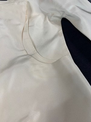 Lot 107 - An Alexander McQueen off-white silk faille mantle, Spring-Summer 2005