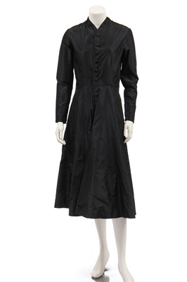 Lot 382 - A Jean Patou couture black taffeta dinner dress, early 1950s