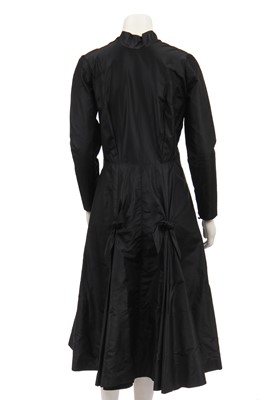 Lot 382 - A Jean Patou couture black taffeta dinner dress, early 1950s