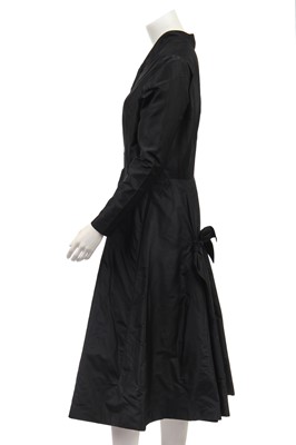 Lot 382 - A Jean Patou couture black taffeta dinner dress, early 1950s