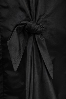 Lot 382 - A Jean Patou couture black taffeta dinner dress, early 1950s
