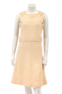 Lot 291 - A Courrèges beige pinafore dress, circa 1970