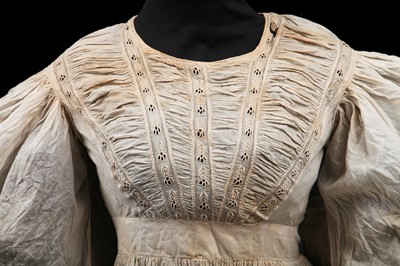 Lot 520 - A sprigged muslin dress, 1805-10