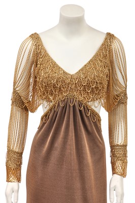 Lot 292 - A Loris Azzaro gilt chainmail and jersey evening dress, 1970s
