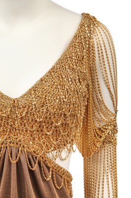 Lot 292 - A Loris Azzaro gilt chainmail and jersey evening dress, 1970s