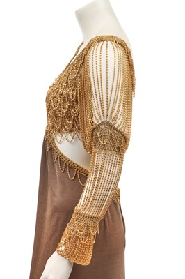 Lot 292 - A Loris Azzaro gilt chainmail and jersey evening dress, 1970s
