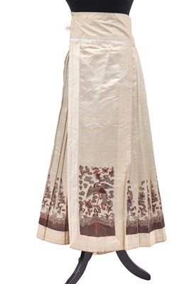 Lot 551 - An embroidered ivory silk skirt, Chinese, 1920s