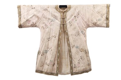 Lot 551 - An embroidered ivory silk skirt, Chinese, 1920s