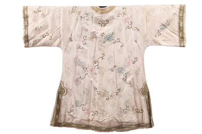 Lot 551 - An embroidered ivory silk skirt, Chinese, 1920s