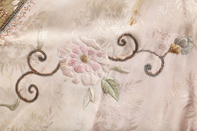 Lot 551 - An embroidered ivory silk skirt, Chinese, 1920s