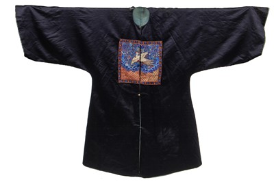 Lot 553 - A dark blue satin surcoat, Chinese, late 19th Century