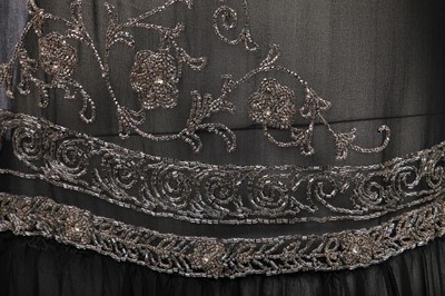 Lot 475 - A black chiffon beaded flapper dress, 1925