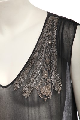 Lot 475 - A black chiffon beaded flapper dress, 1925