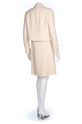 Lot 14 - A Chanel cream wool dress and matching jacket,...