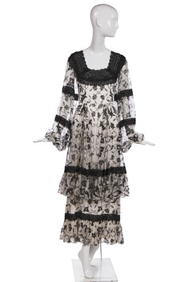 Lot 324 - A Thea Porter black and white floral printed chiffon dress, 1970s