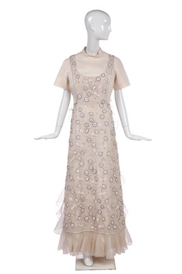 Lot 309 - A Christian Dior by Marc Bohan off-white slubbed-gazar evening gown, early 1970s