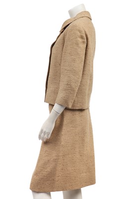 Lot 359 - A Givenchy couture oatmeal tweed suit, circa 1966