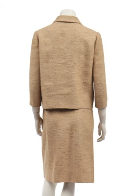Lot 359 - A Givenchy couture oatmeal tweed suit, circa 1966