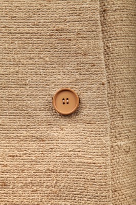 Lot 359 - A Givenchy couture oatmeal tweed suit, circa 1966